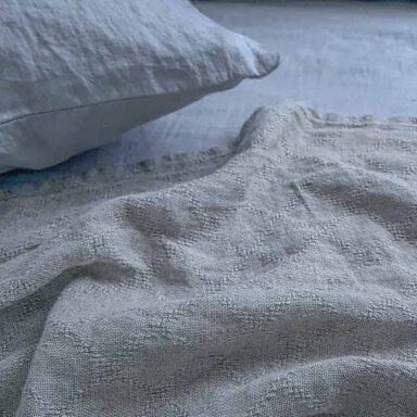 sengetæppe hør natur